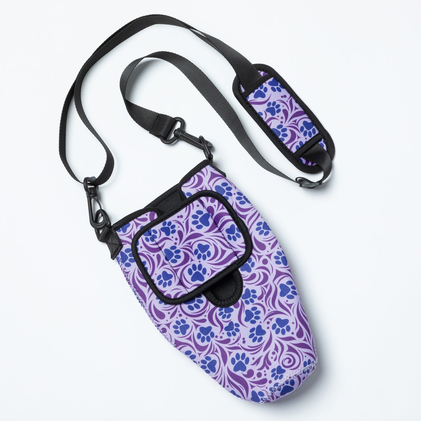 Purple water bottle carrier bag with paw print design and adjustable shoulder strap.