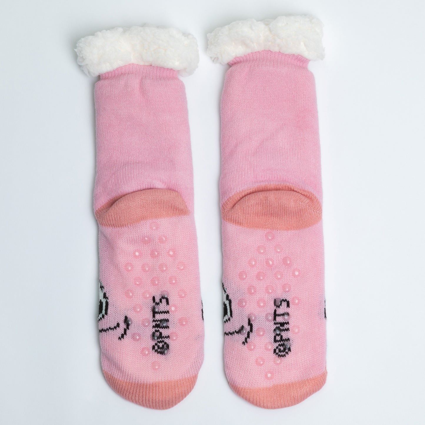 Pair of pink socks with white fur around the top on a light gray background