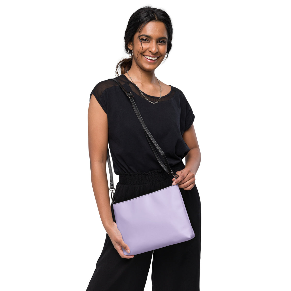 Woman holding a purple handbag with on a white background