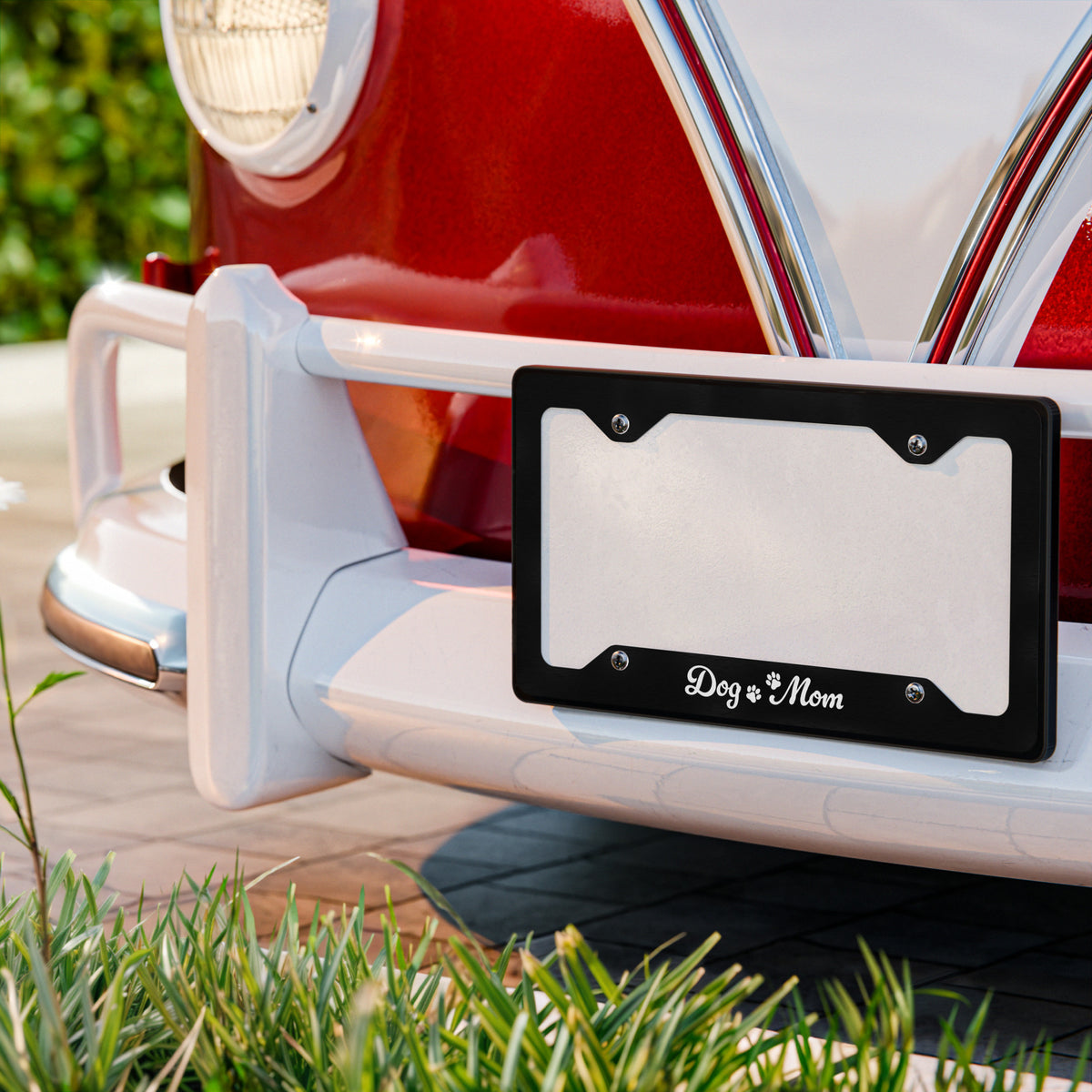 License plate holder with a red vehicle in the background