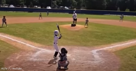 Brave Umpire Pulls 7-Year-Old Baseball Player From A Dust Devil