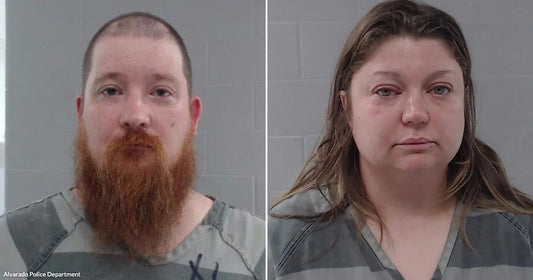 On the left, a man with a red beard in striped prison attire stands against a concrete block wall; on the right, a woman with long brown hair in similar.