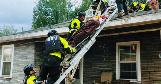 Firefighters Help Rescue People and Pets Who Have Been Stranded for Days, Many on Roofs