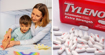 Young boy wearing headphones concentrates while drawing at a classroom desk, with a bottle of acetaminophen tablets beside him.
