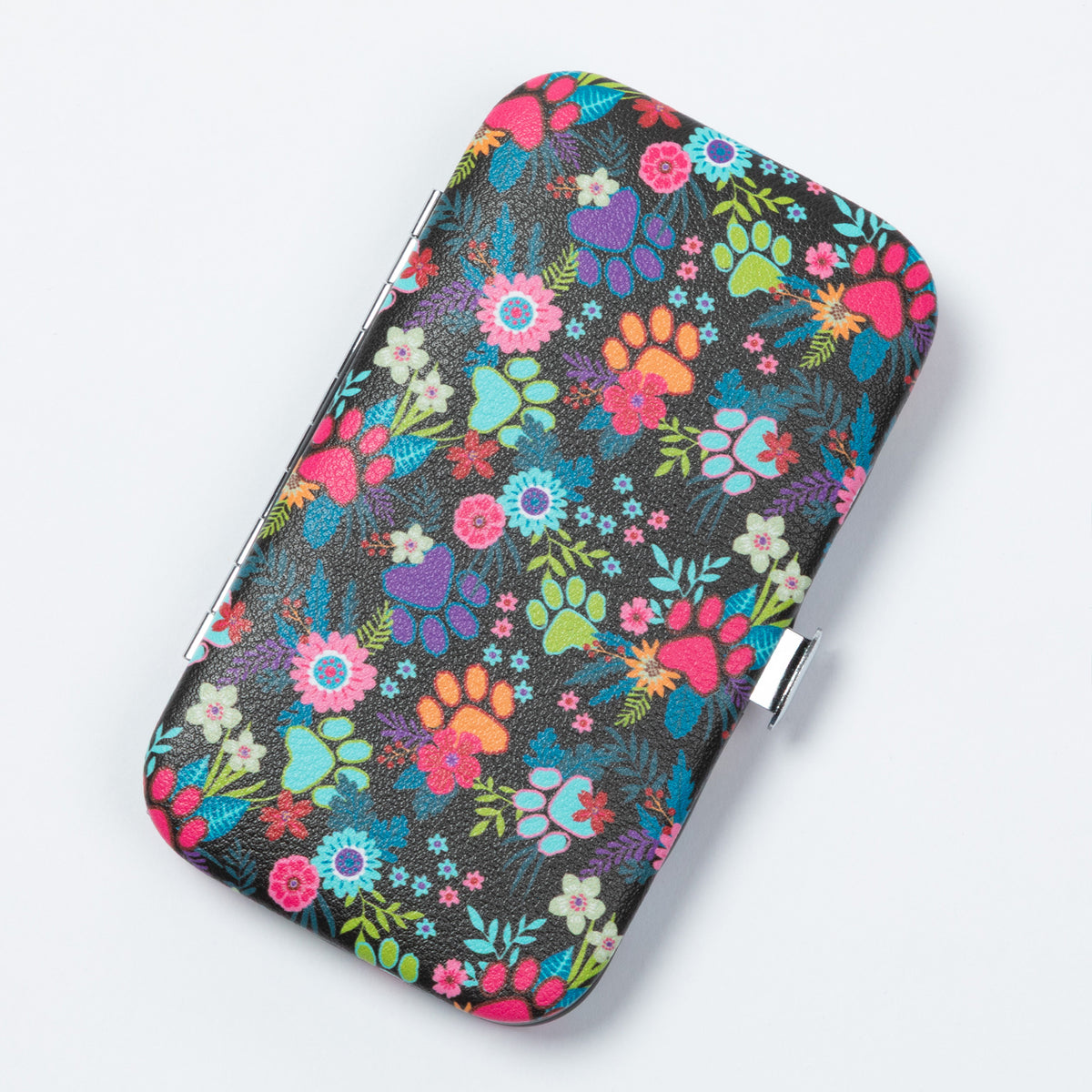 A rectangular metal case with rounded corners, featuring a vibrant multicolor floral and paw-print pattern on a black background, shown on a light gray background.