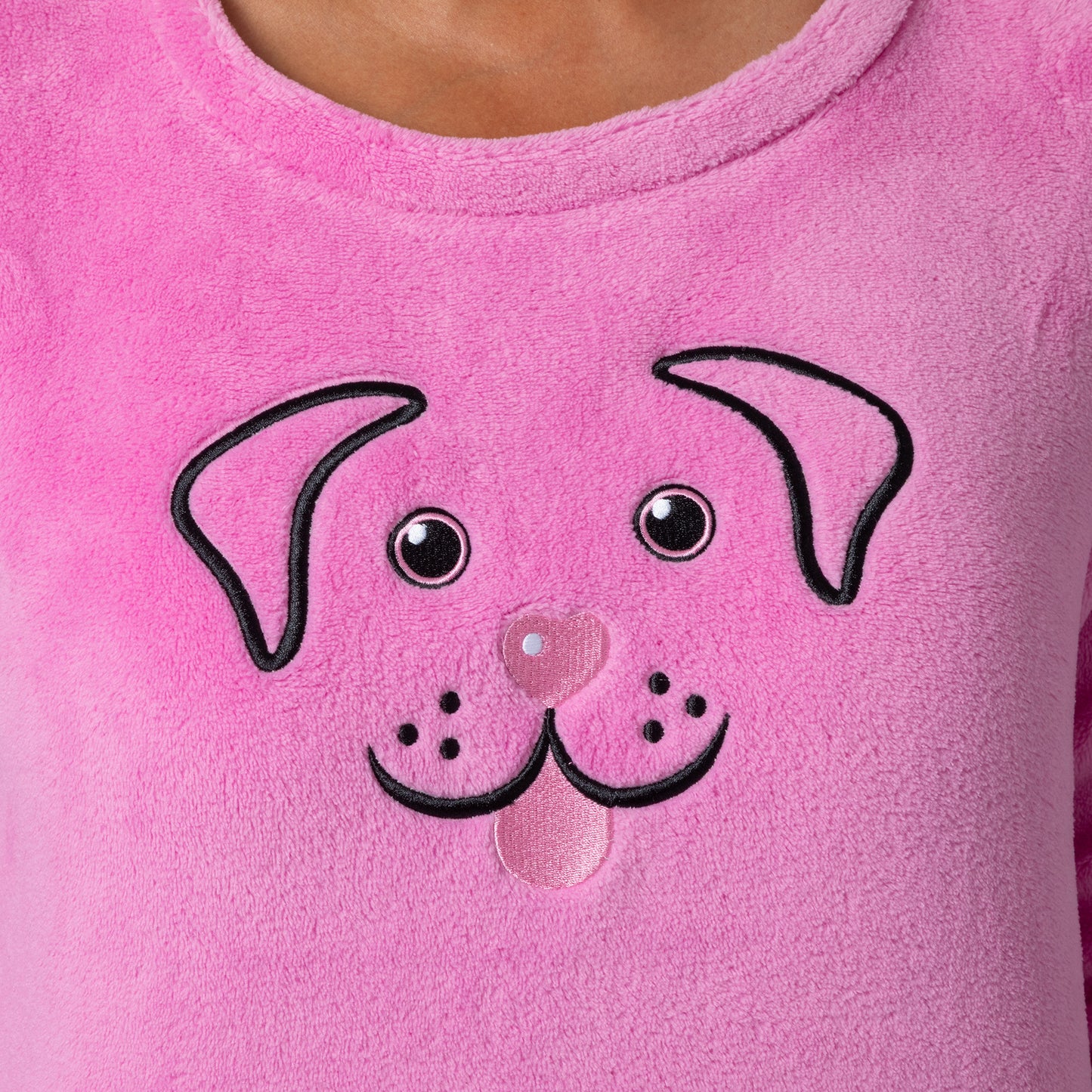 Detail image of pink long-sleeve top with an embroidered dog face design Design a pink dog in super cozy fabric