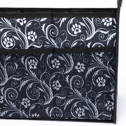 Black and white patterned bag with paw prints on a white background