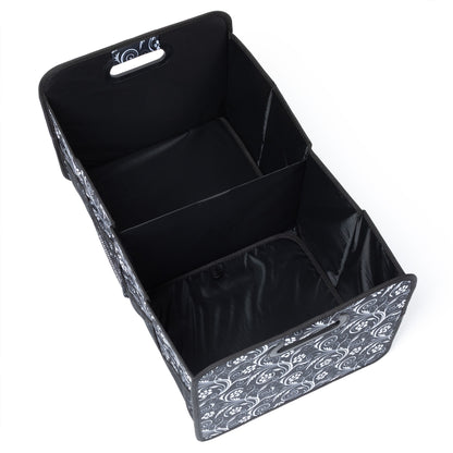 Black storage box with paw print and swirl pattern on a white background