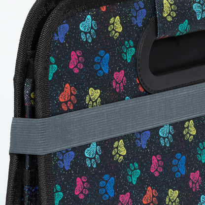 Close up of black trunk organizer with colorful paw print pattern on a white background