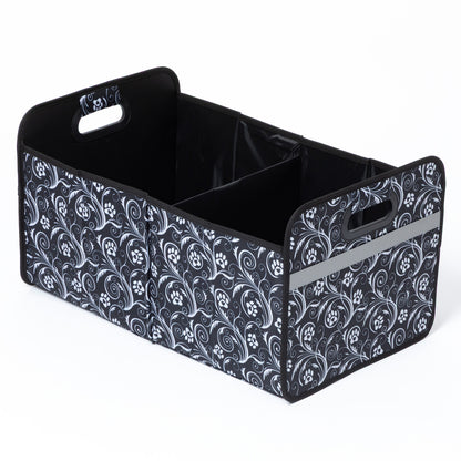 Black storage bin with floral and paw pattern on a white background