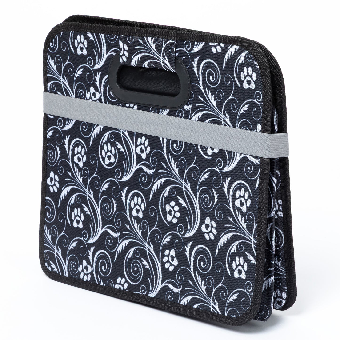 Black and white patterned bag with paw prints on a white background