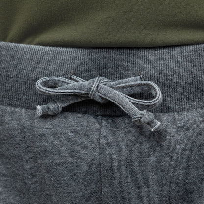 Close-up of gray drawstring waist on a gray pair of board shorts