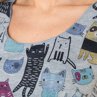 Close up of gray tank top with colorful cat pattern