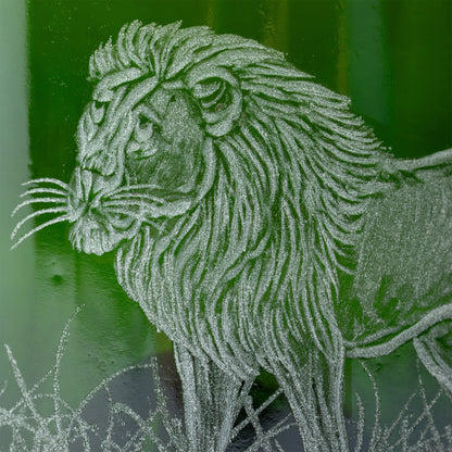 Detailed line drawing of a lion on a textured green recycled glass background