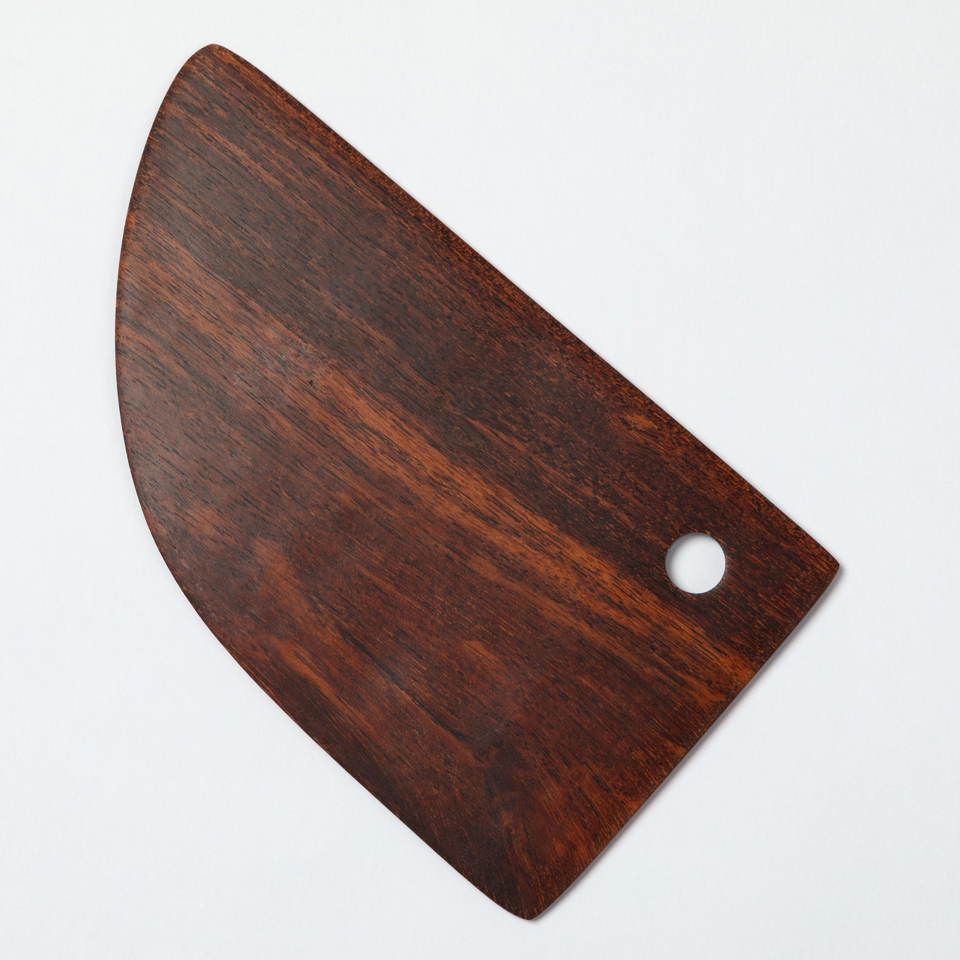 Wooden pastry blade on a white background