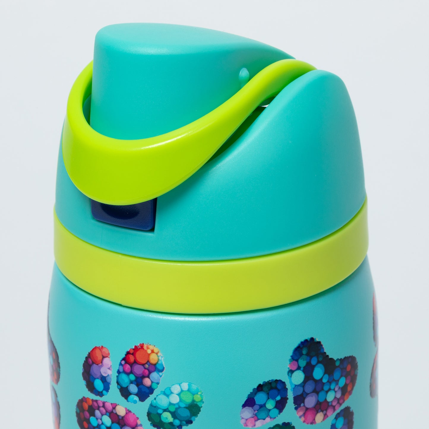 Light blue water bottle with colorful paw prints on a white background