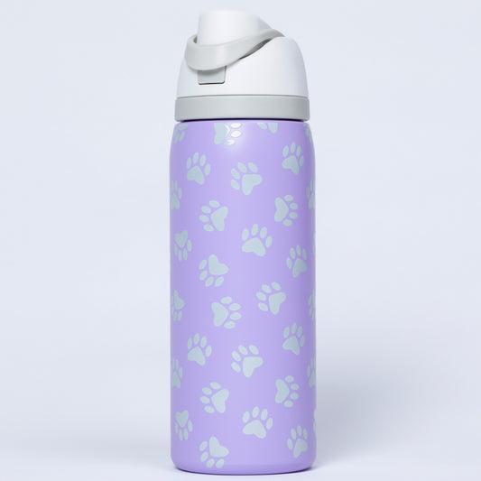 Purple water bottle with white paw prints and white lid on a light gray background