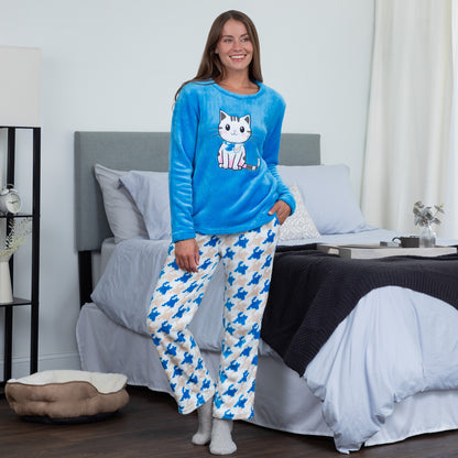 A woman wearing a blue long-sleeve top with an embroidered cute cat design and gray, blue and light blue houndstooth pattern. Design of a blue cat in plush super cozy fabric 