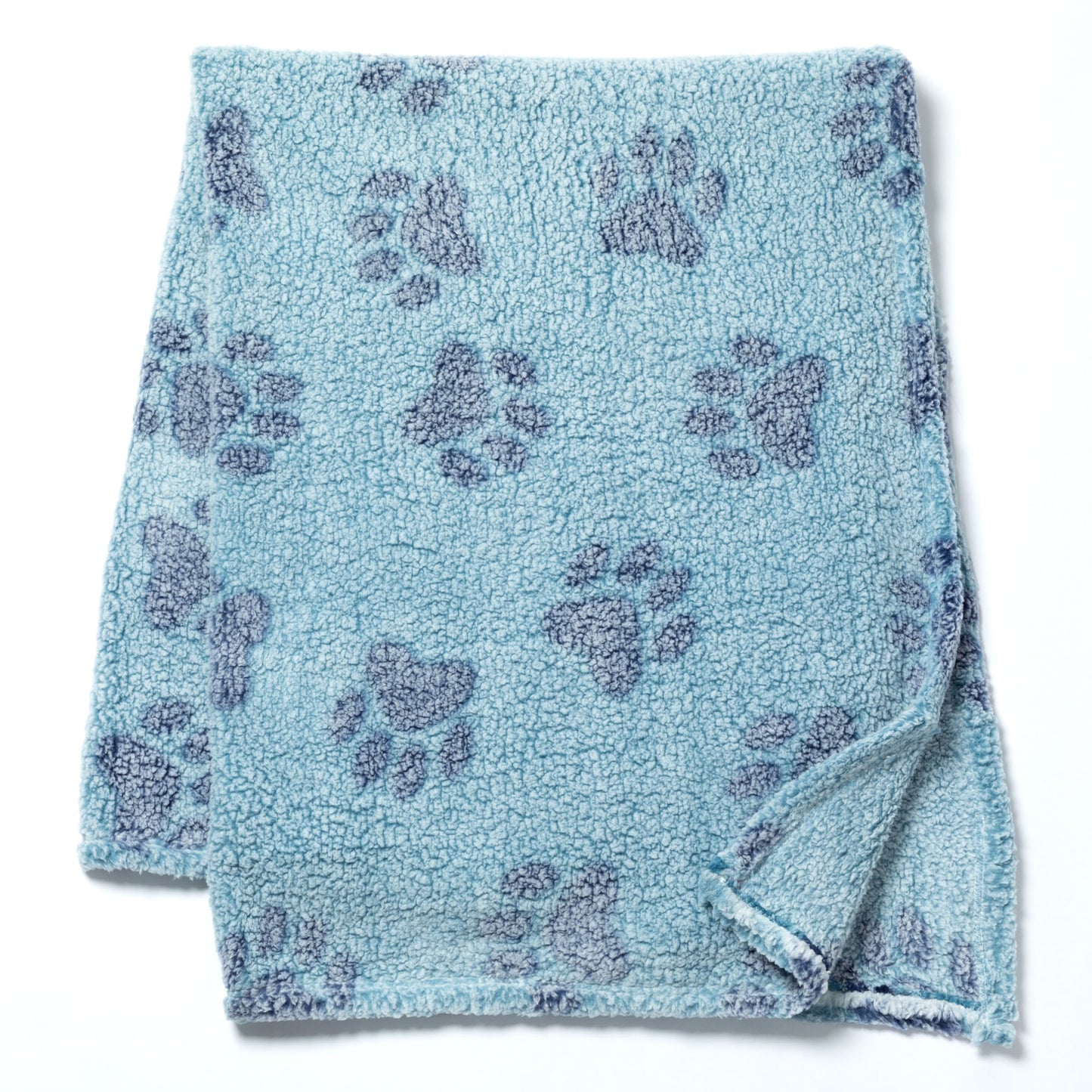 A light blue fleece blanket with a repeating dark blue paw print pattern, folded neatly on a white background.