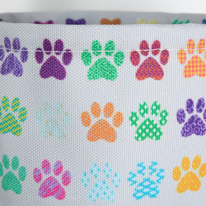 Close up of paw print design on collapsible car trash can