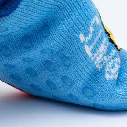 Close-up of a blue sock with textured sole and brand logo.