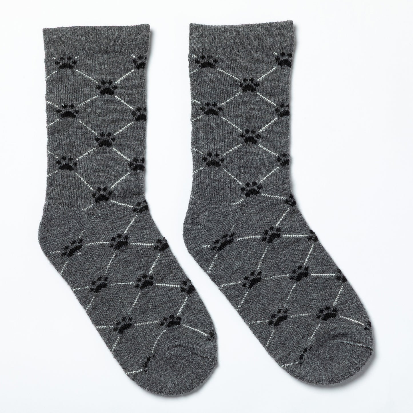 Gray socks with black paw print pattern on a white background