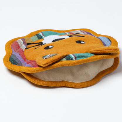 Pair of orange tortilla holders with a cartoon face design on a white background

