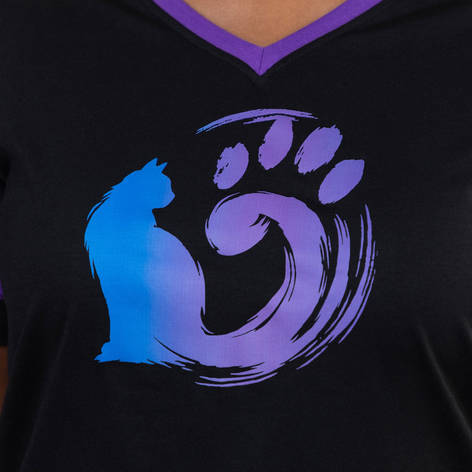 Black V-neck shirt with blue cat silhouette and purple paw print design.
