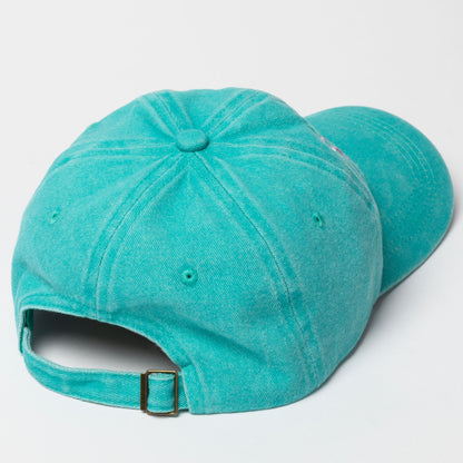 Teal baseball cap on a light gray background