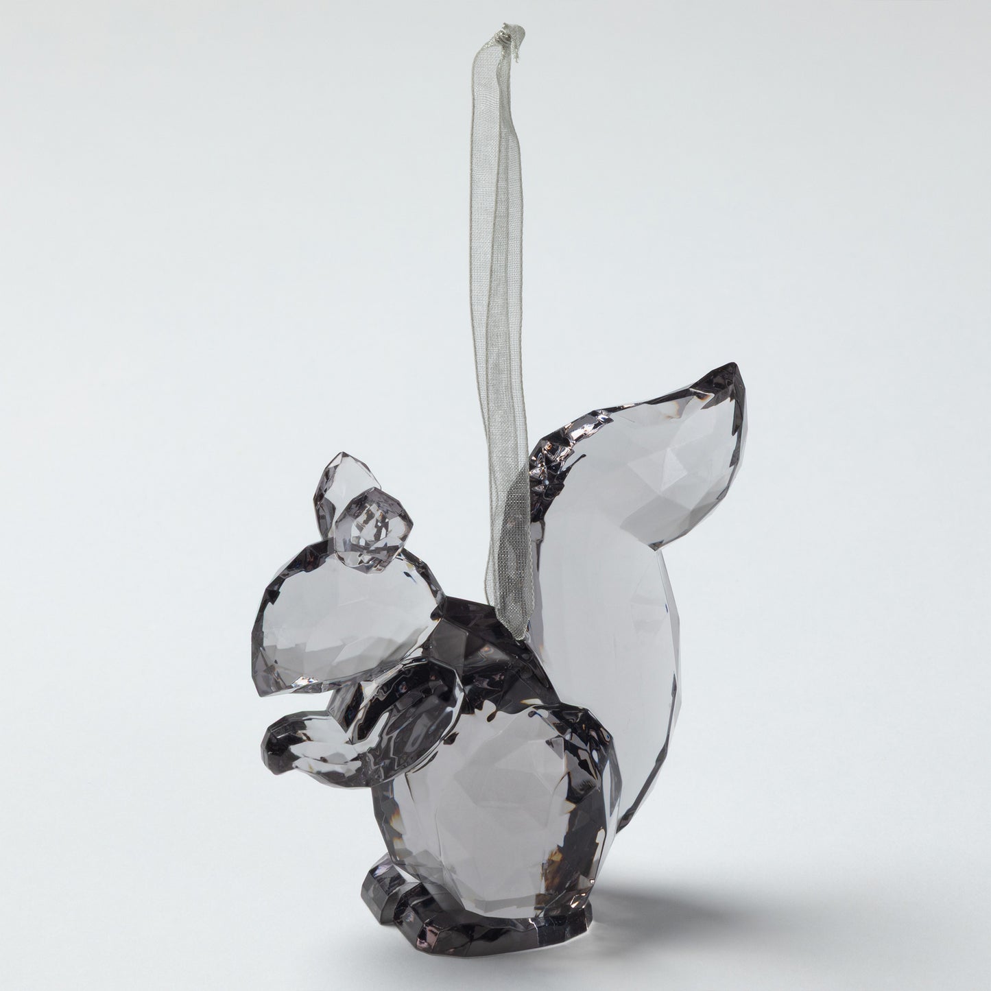 Crystal squirrel figurine on a white background