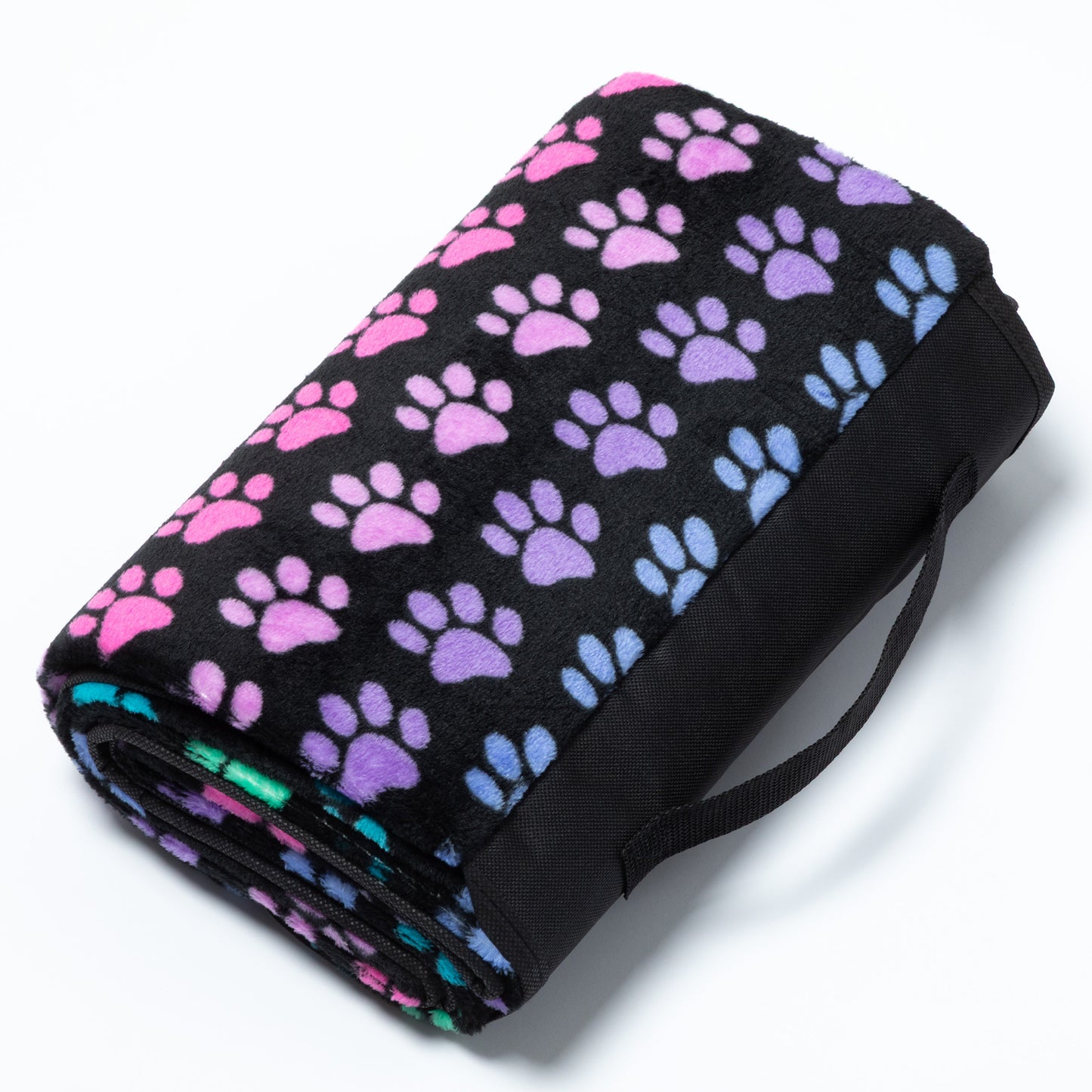 Folded blanket with colorful paw pattern on a white background.