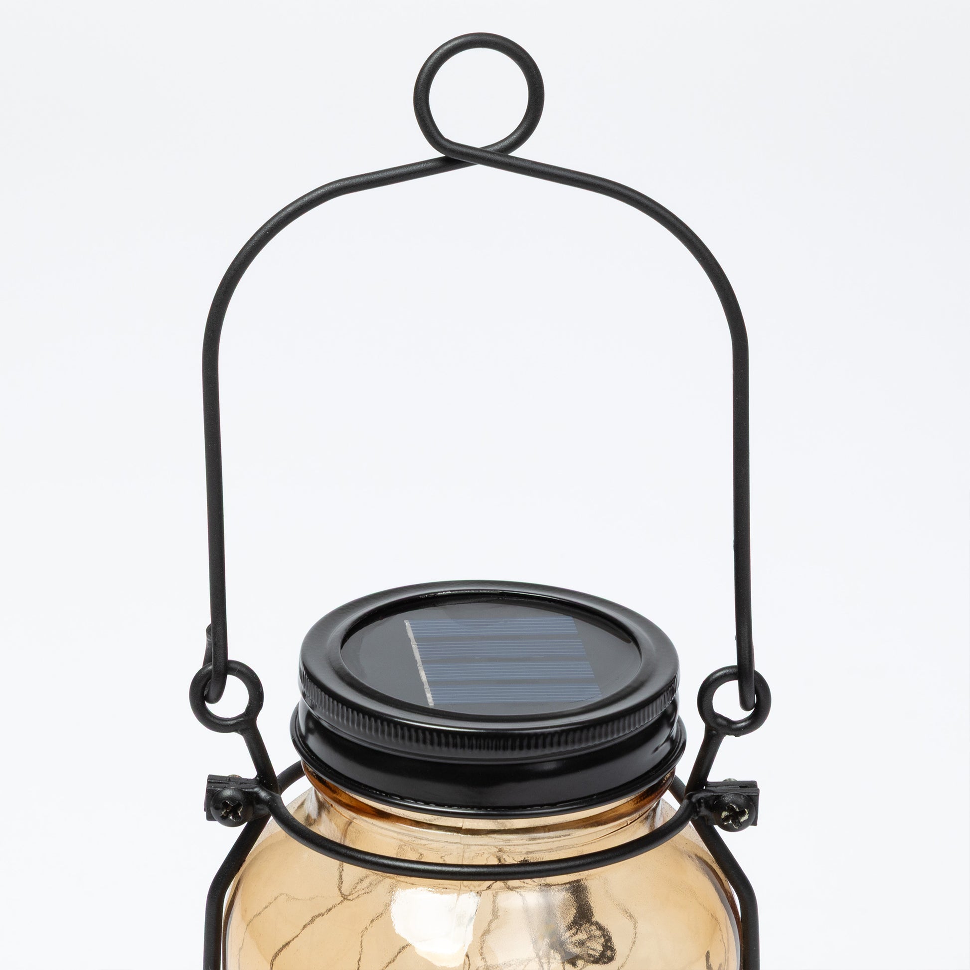 Solar-powered lantern with a glass jar body on a white background