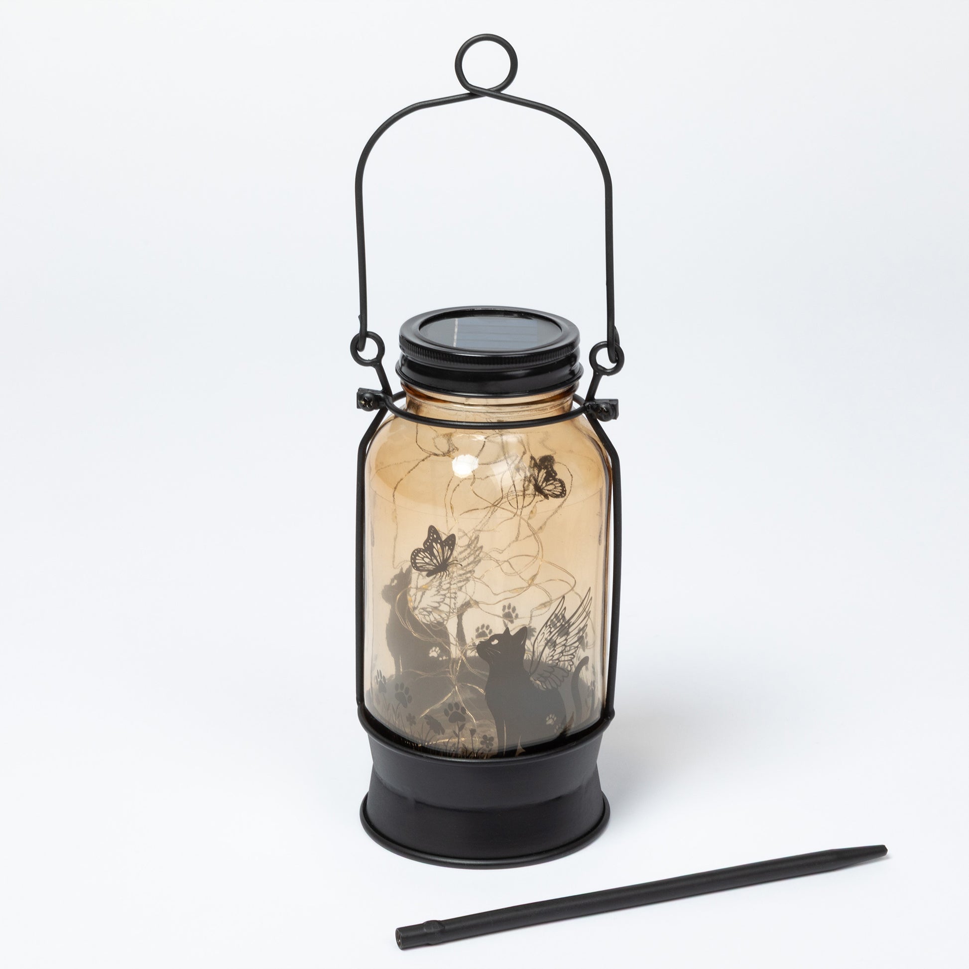 Decorative lantern with fairy design on a white background
