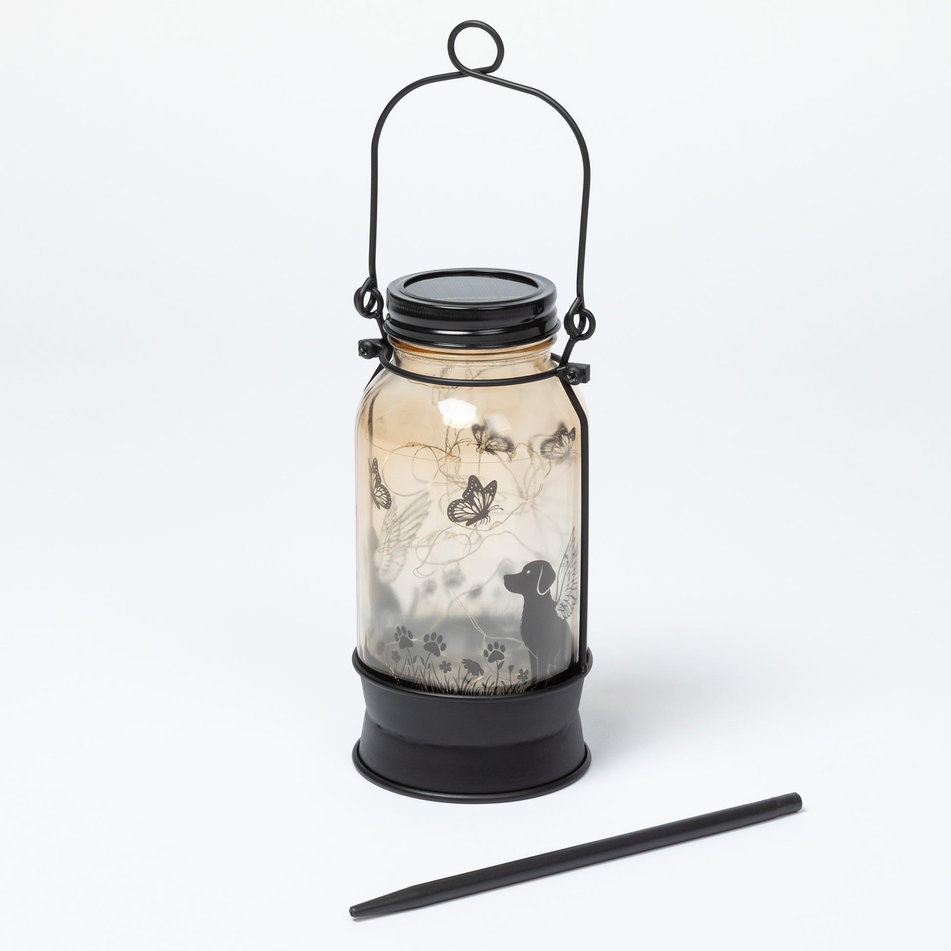 Solar lantern with decorative design on a white background