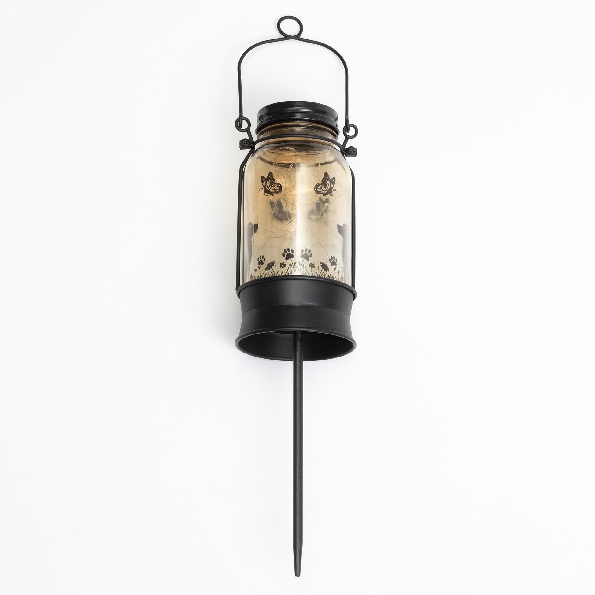 Decorative lantern with butterfly design on a white background