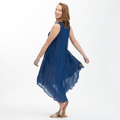 Woman wearing a blue dress on a white background