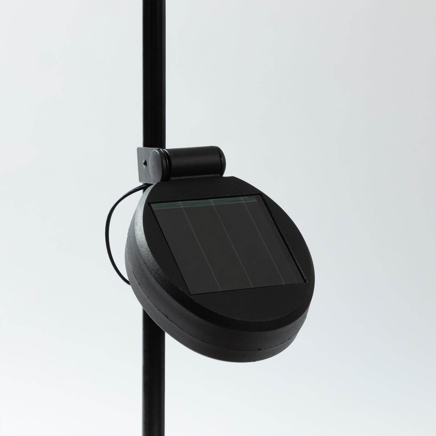 a close up image of the solar component of the garden stake
