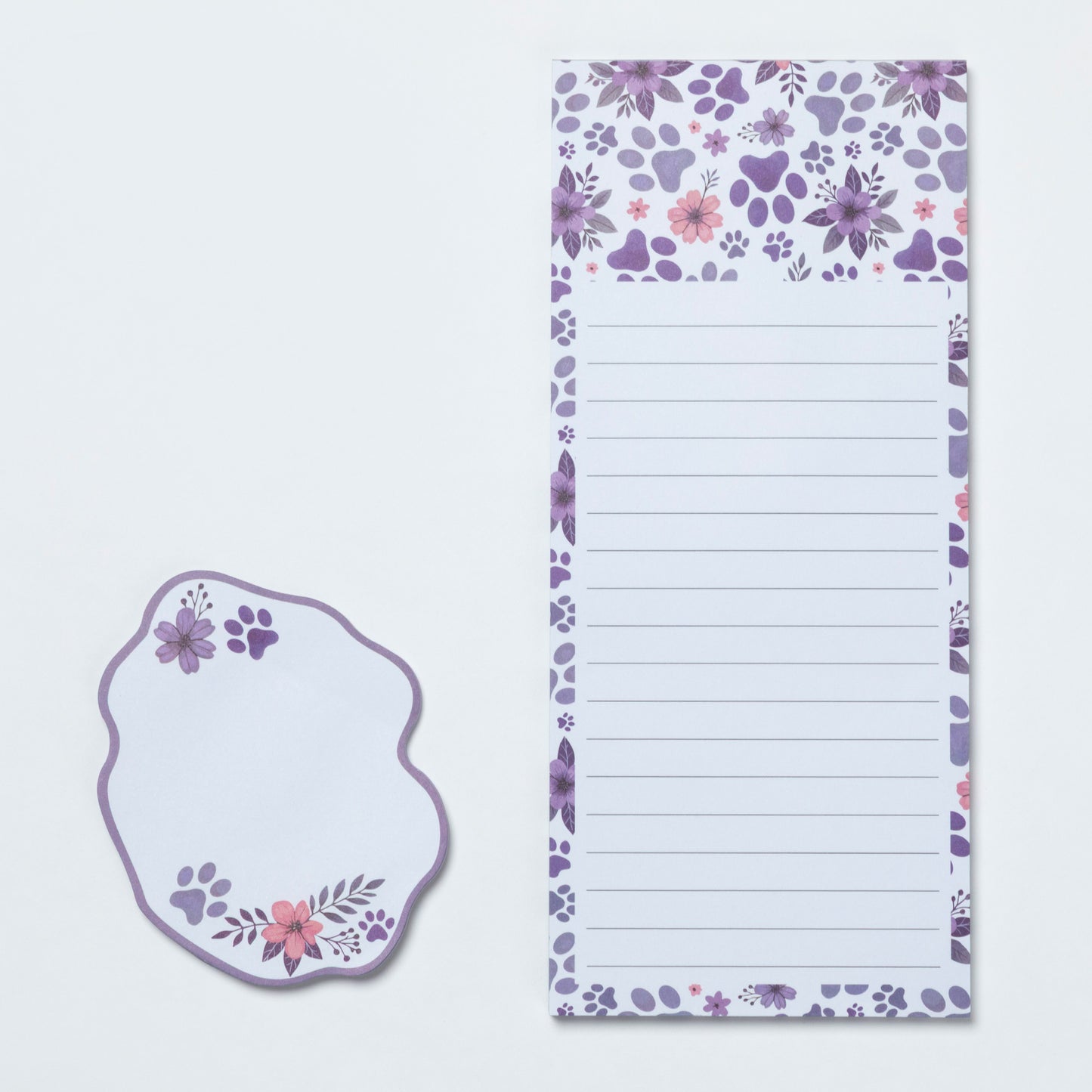 Floral notepad with a matching sticky note on a light purple background