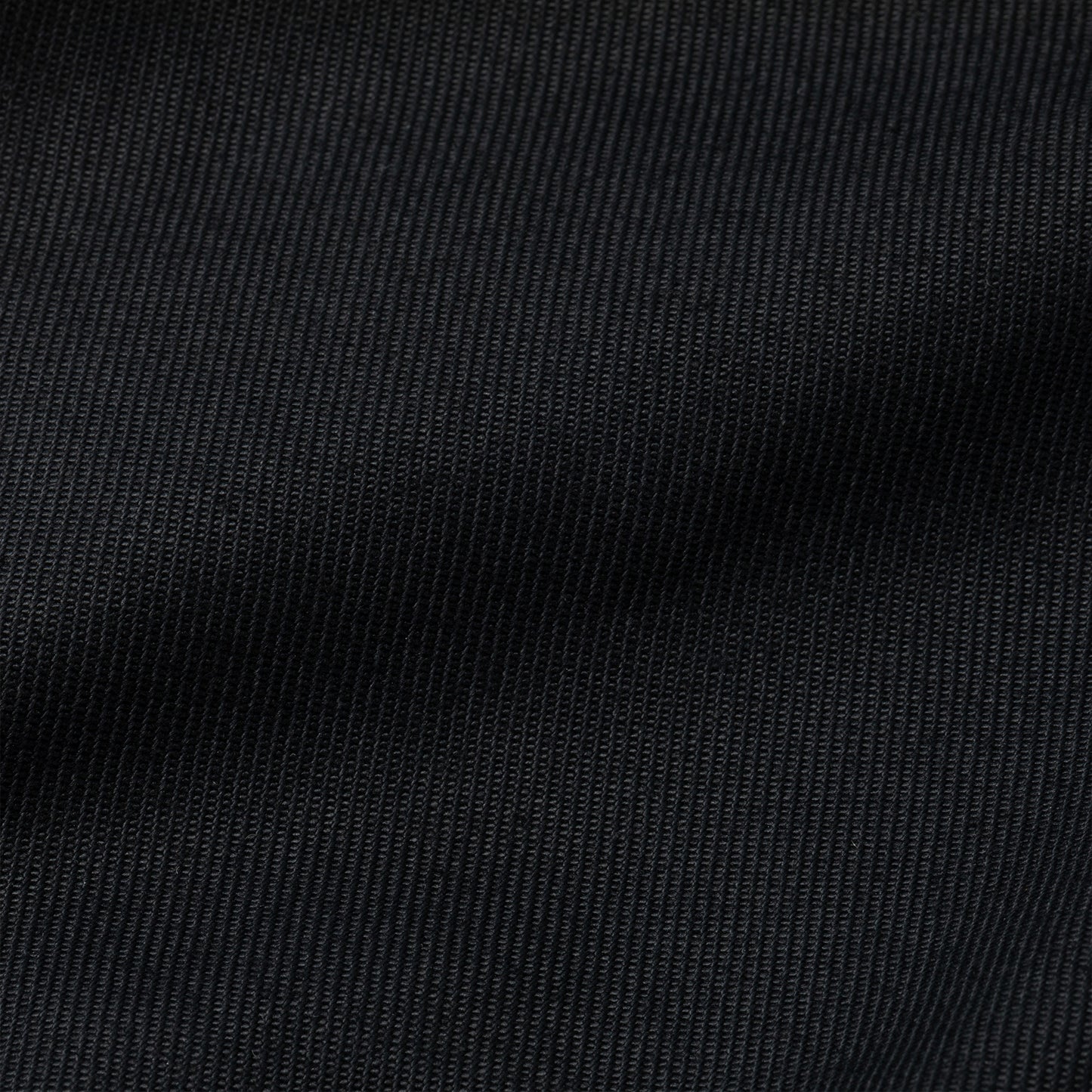 Close-up of black fabric texture of kevlar bite guard gloves