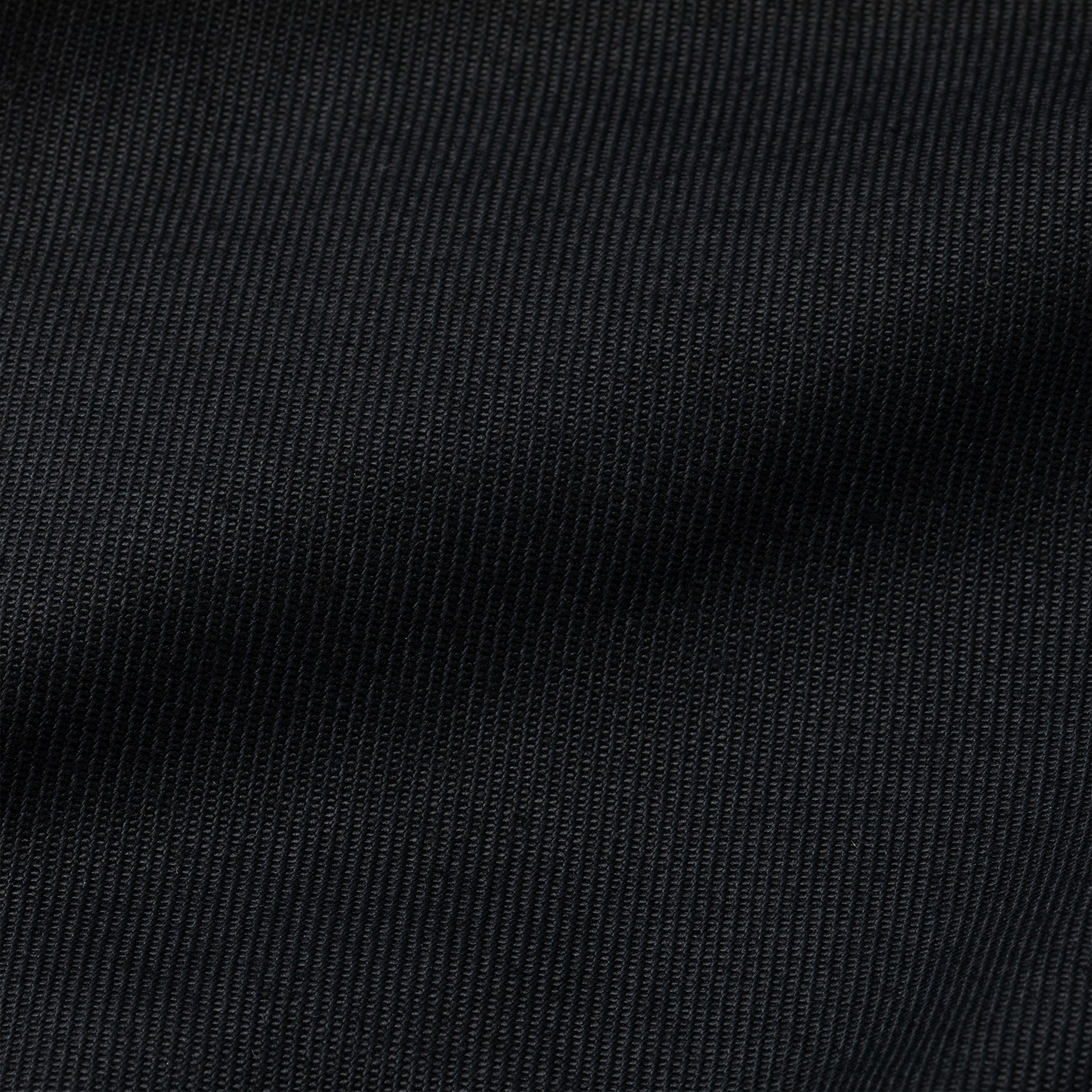 Close-up of black fabric texture of kevlar bite guard gloves
