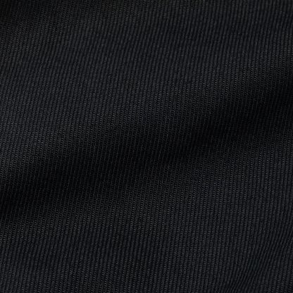 Close-up of black fabric texture of kevlar bite guard gloves
