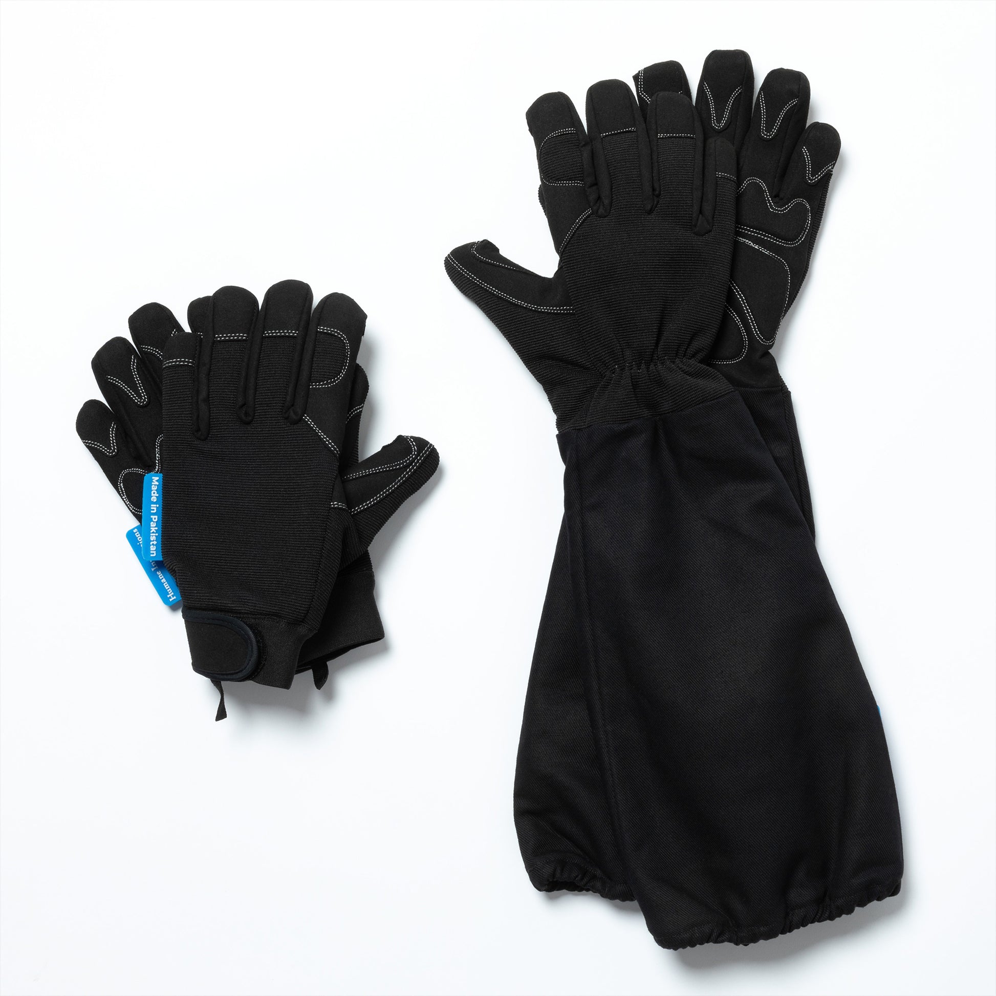 Black gloves with a blue tag on a white background
