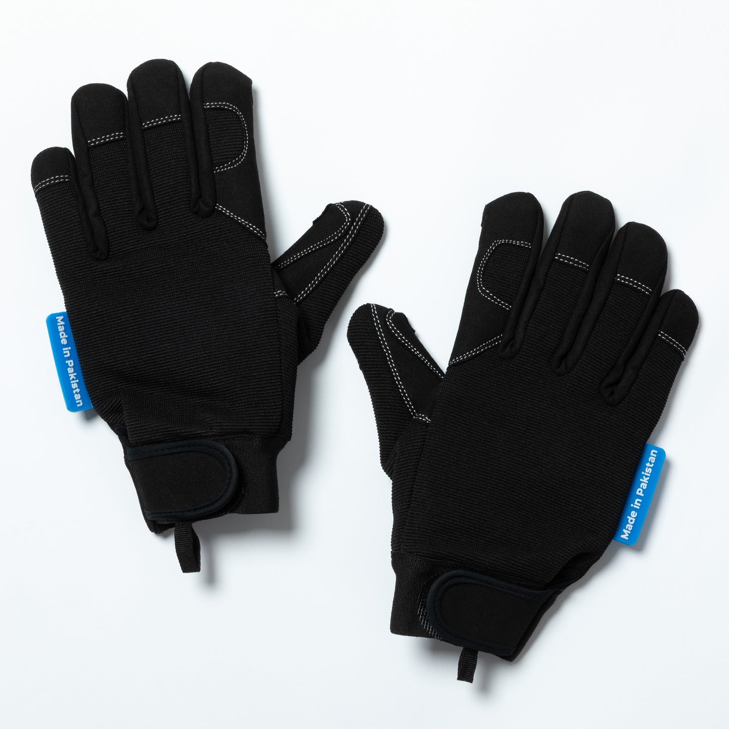 Pair of black bite blocker gloves with blue label on a white background