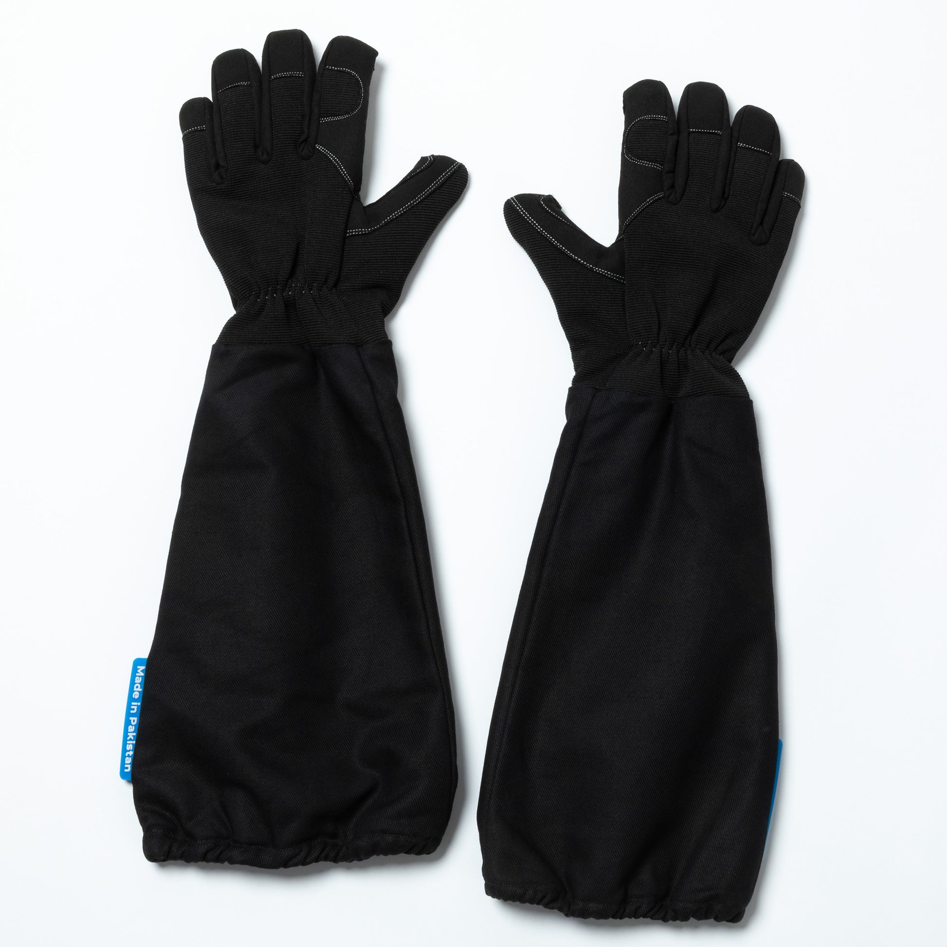 Pair of black bite guard gloves on a white background