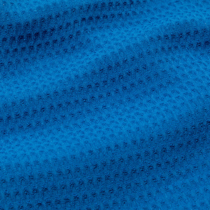 Close-up of blue waffle weave textured fabric