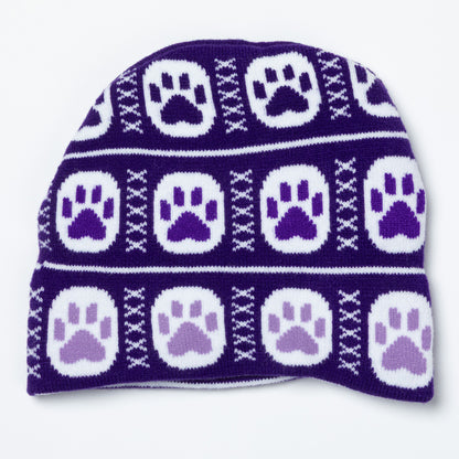 Purple knit beanie with white and purple paw print pattern on a white background