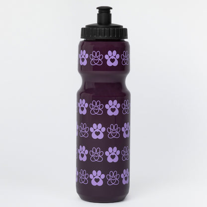 A dark purple plastic water bottle with a black flip-top cap, decorated with a repeating pattern of light purple paw prints, shown on a light gray background.