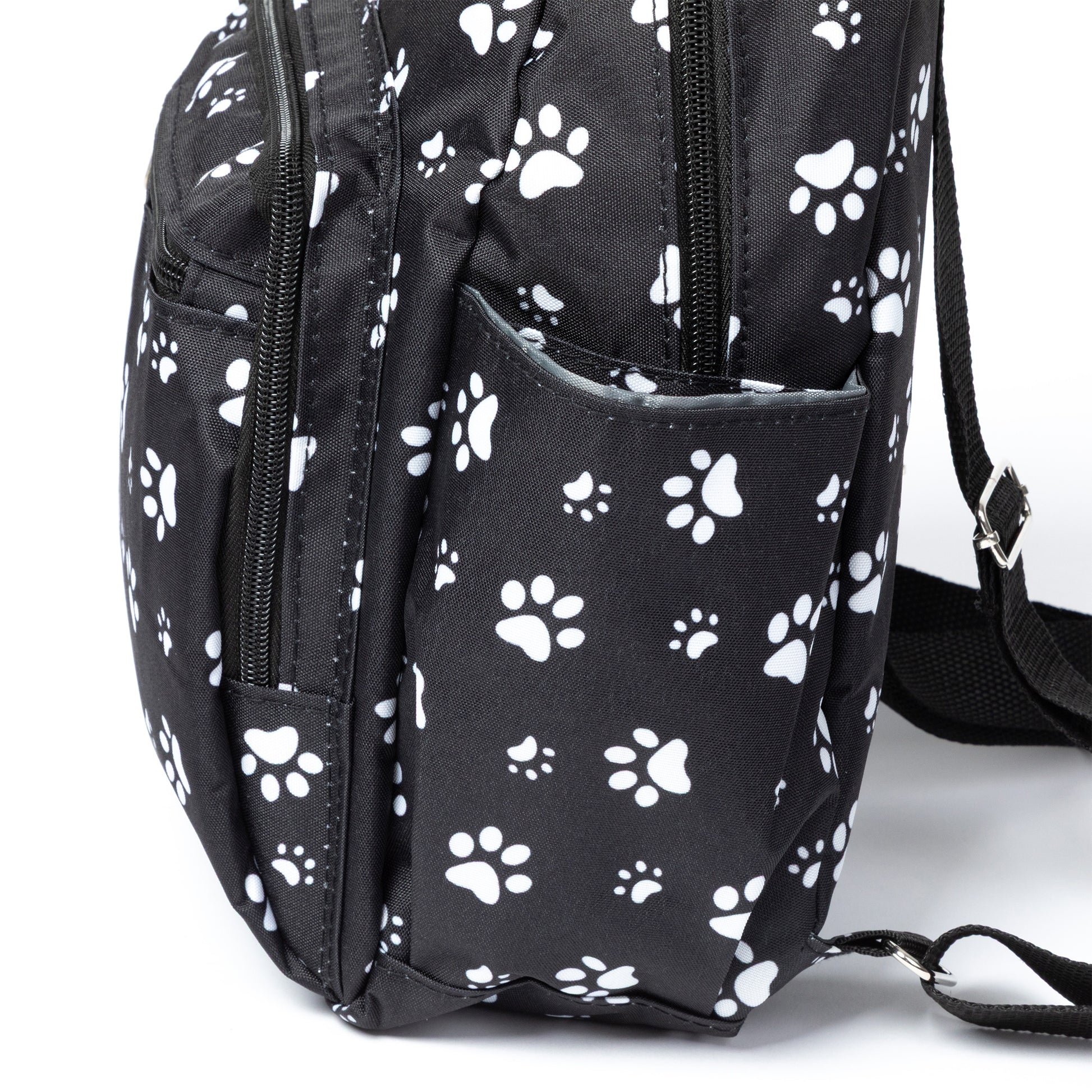 Black backpack with white paw prints on a white background