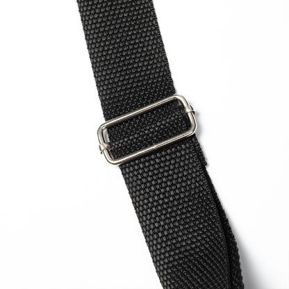Black woven strap with a silver buckle on a white background