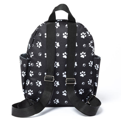 Black backpack with white paw prints on a white background